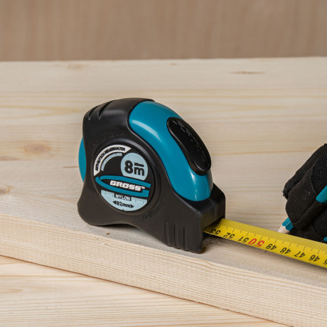 Рулетка "Schlagfest",8 м x 25 мм,магнитный обрезиненный зацеп,двусторонняя шкала,Нейлоновое покрытие,автоматическая фиксация Gross