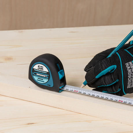 Рулетка "Ergonomisch",5 м x 25 мм,магнитный обрезиненный зацеп Gross